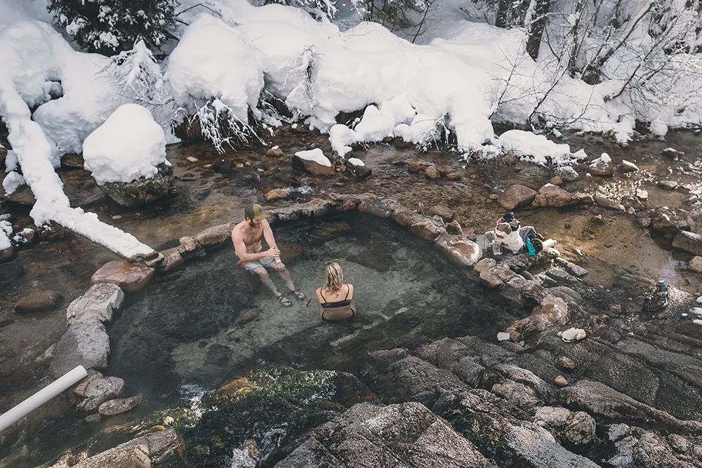 Couple sitting in Hot Springs_Trail Creek_credit Visit Idaho copy