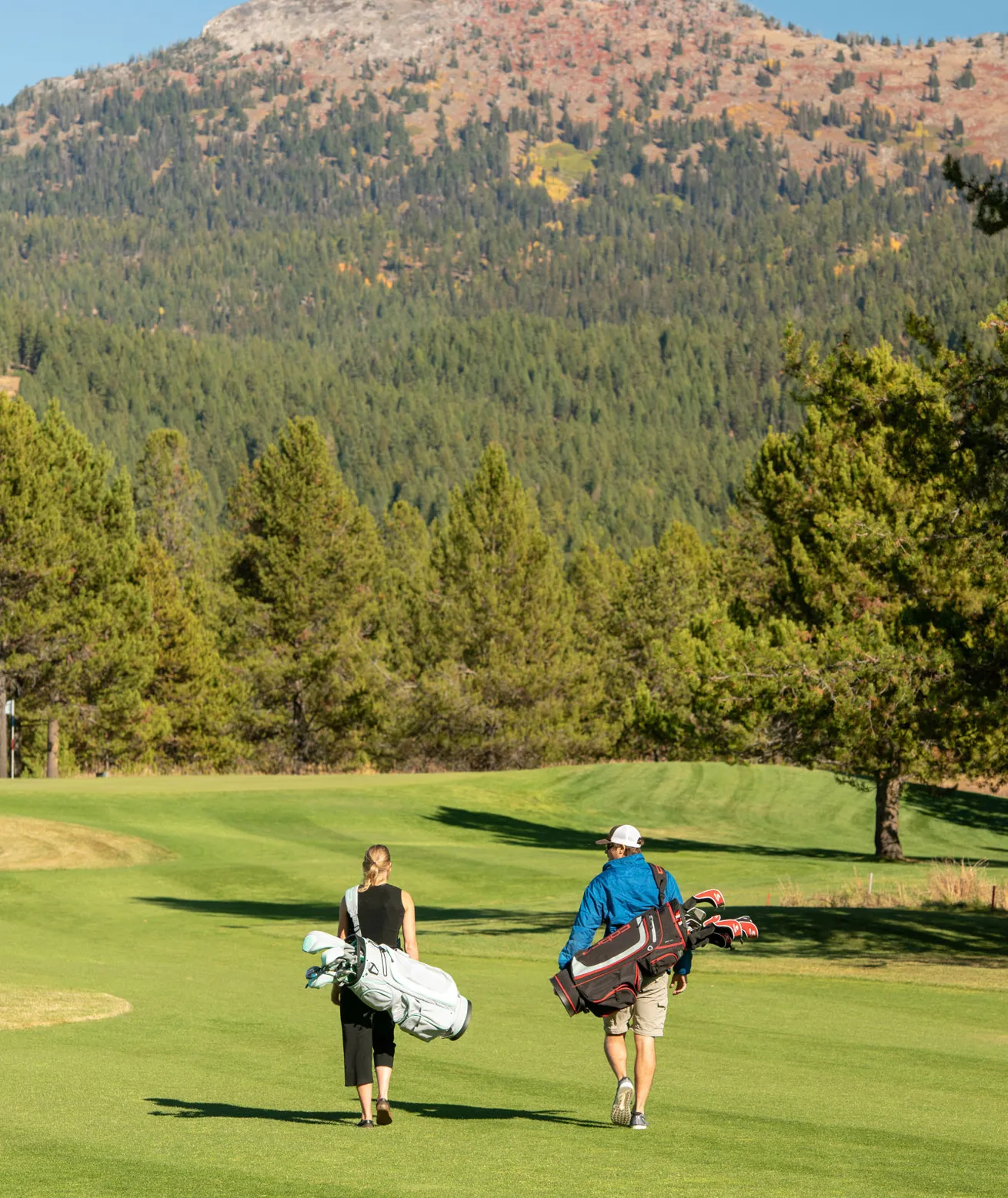 couple golfing in new meadows