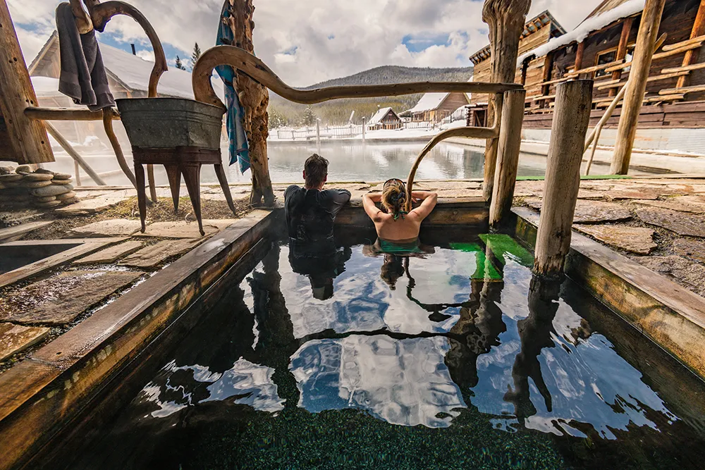 couple relaxing in hotspring at burgdorf